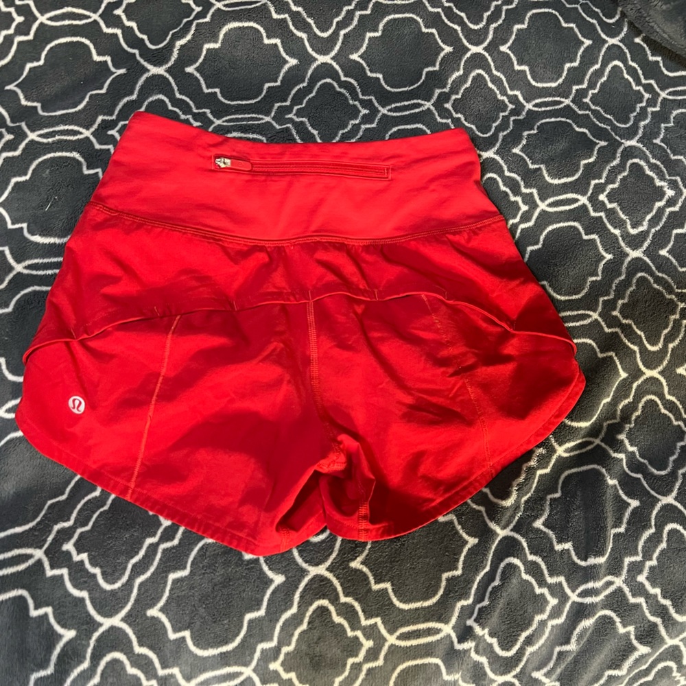 Red Lululemon shirts sizes 2 in good condition